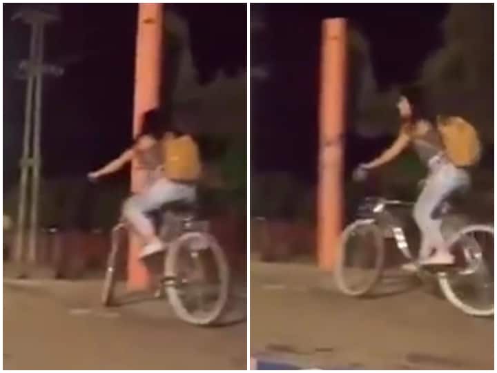 Video: साइकिल चलाते हुए स्टंट दिखा रही थी लड़की, आगे जो हुआ उसे देख लोग दंग रह गए girl doing stunt while riding bicycle failed met with accident shocking viral video Video: साइकिल चलाते हुए स्टंट दिखा रही थी लड़की, आगे जो हुआ उसे देख लोग दंग रह गए