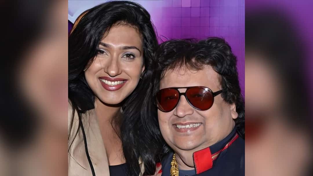 Rituparna Sengupta: 'সারাজীবন তোমার স্মৃতি লালন করব...'বাপি লাহিড়ির স্মৃতিচারণায় ঋতুপর্ণা Rituparna Sengupta shared a picture in memory of Bapi Lahiri Rituparna Sengupta: 'সারাজীবন তোমার স্মৃতি লালন করব...'বাপি লাহিড়ির স্মৃতিচারণায় ঋতুপর্ণা