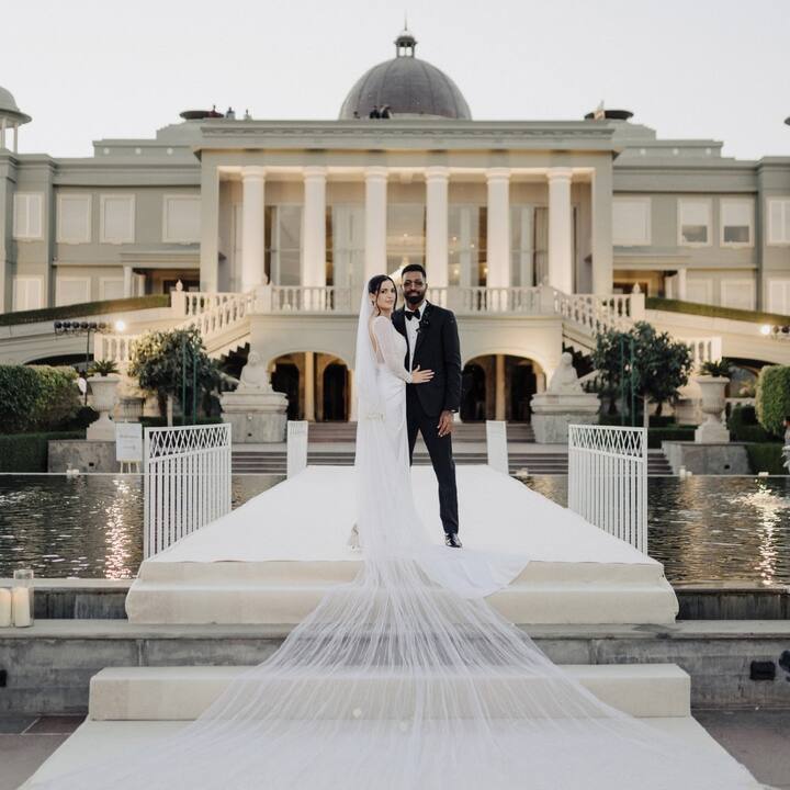 Natasa was dressed in her white wedding gown, Hardik looked dapper in a black tuxedo.