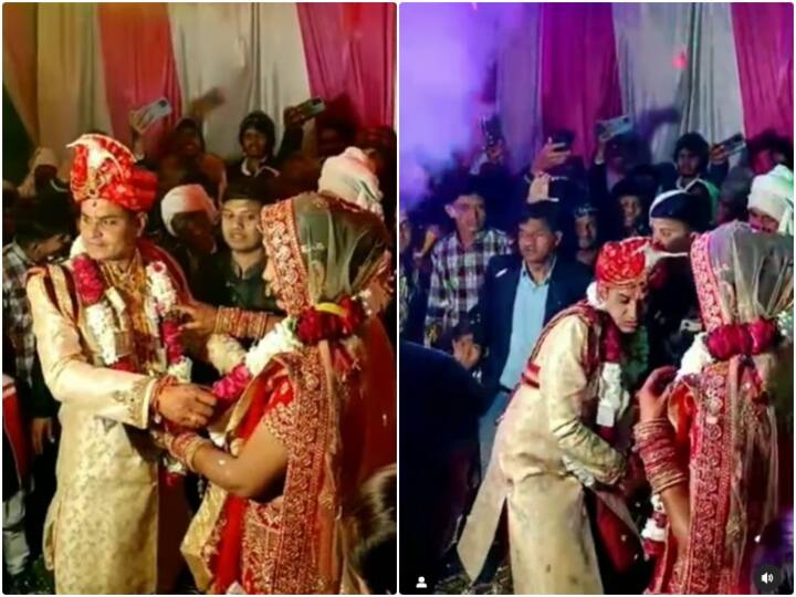 Video: जयमाला के दौरान पटाखा चलते ही डर गया दूल्हा, यूजर्स बोले- क्या दूल्हा बनेगा रे तू Seeing groom being scared of sound of firecrackers users are seen making fun of him Video: जयमाला के दौरान पटाखा चलते ही डर गया दूल्हा, यूजर्स बोले- क्या दूल्हा बनेगा रे तू
