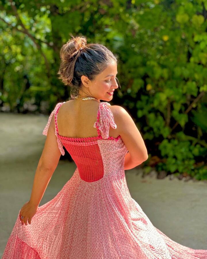 Recently, she posted pictures from the vacation wearing a pink long dress. (Image Source: Instagram)