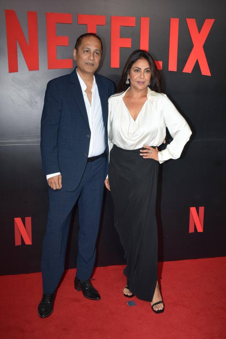 Actress Shefali Shah looked her formal best in a white silk shirt and black skirt as she posed with her husband and filmmaker Vipu Amrutlal Shah who opted for a blue suit paired with a white shirt.
