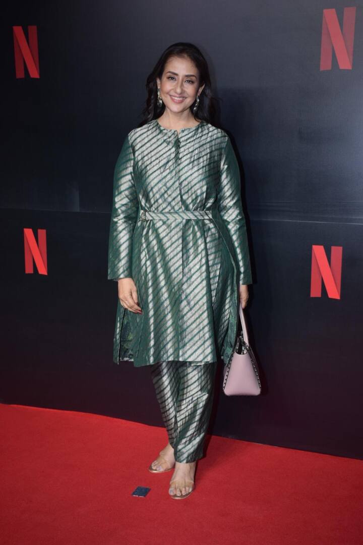 Manisha Koirala, who is all set to be seen next in Sanjay Leela BHansali's 'Heeramandi' arrived dressed in a teal green suit. She looked gorgeous and charmed with her alluring smile.