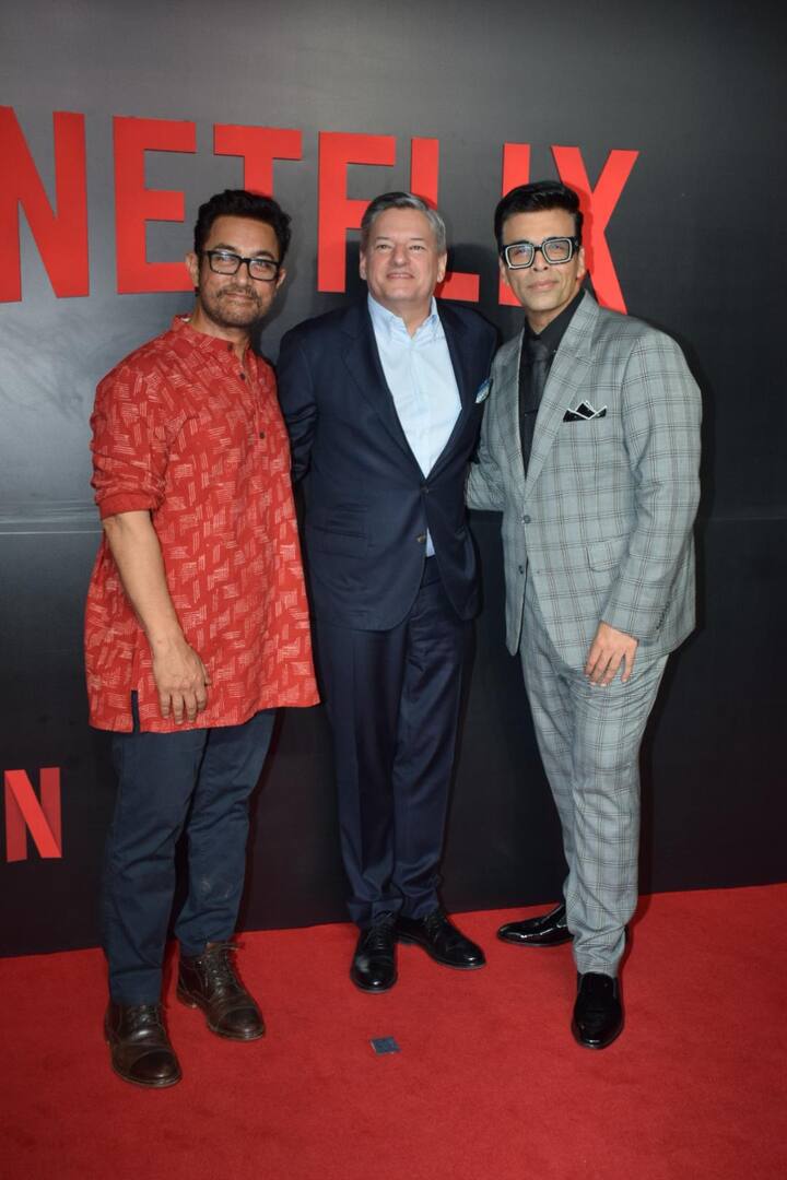 Karan Johar chose a black shirt, a tie that matched it, a grey jacket, and grey pants. Aamir also posed for pictures during the event with Karan, Hansal, and Zoya, among others.