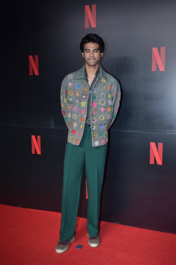 Late actor Irrfan Khan's son Babil Khan, who made his debut with 'Qala' opposite Tripti Dimri, dressed in a grey shirt and green pants paired with a quirky jacket.