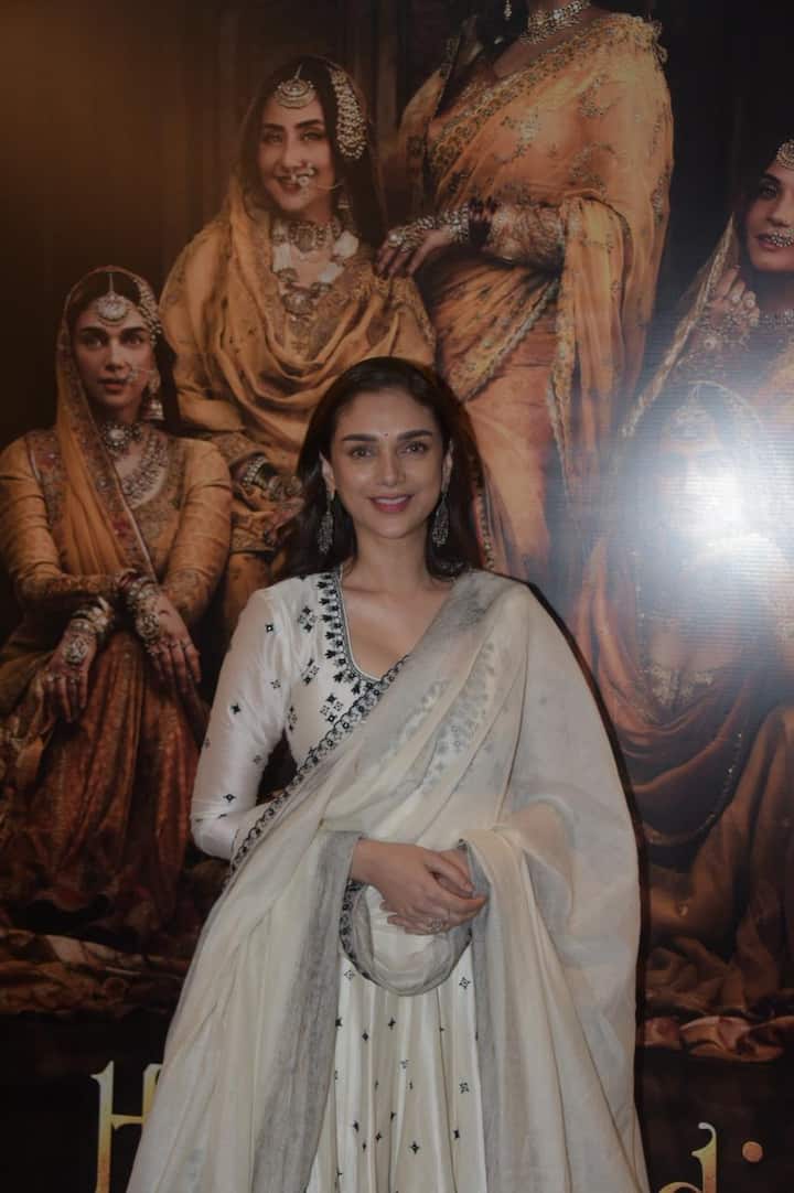Aditi Rao Hydari looked royal in a white embroidered anarkali suit, charming everyone with her alluring smile.