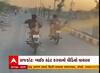 Rajkot:  જાહેર રસ્તા પર બાઈક પર સ્ટંટ કરતા બે યુવાનોનો વીડિયો થયો વાયરલ, Watch Video
