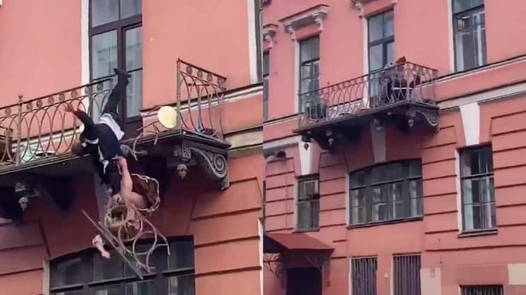 Viral Video Russia Husband wife dispute turns into brawl 1833 historic balcony collapses husband wife marathi news Viral Video: पती-पत्नीच्या वादाचं रुपांतर हाणामारीत, 1833 ची 'ऐतिहासिक बाल्कनी' तुटून जोडपं खाली आपटलं, आता खटला चालणार