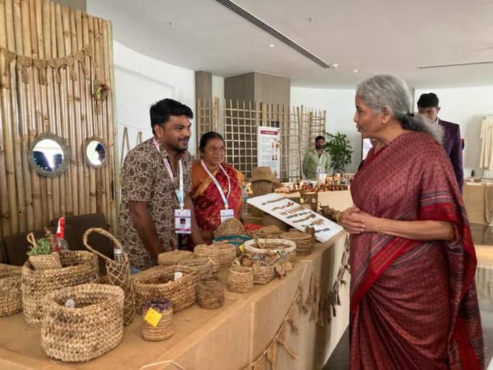 Finance Minister Nirmala Sitharamna also visited various stalls put on display at an exhibition on the sidelines of the FMCBG Meeting. Various start-ups and entrepreneurs, ranging from artificial intelligence and virtual reality to the cottage and handicraft industry, have put their items on display in the exhibition. [Image Credit: Twitter/MoF]