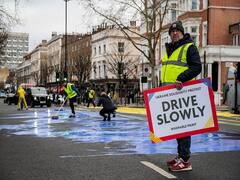 Huge Ukraine Flag Painted In Front Of Russian Embassy In London Ahead Of War Anniversary. In Pics