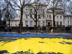 Huge Ukraine Flag Painted In Front Of Russian Embassy In London Ahead Of War Anniversary. In Pics