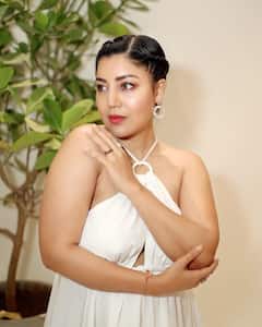 Mother Of Two Debina Bonnerjee Looks Her Best In A White Dress - SEE PICS