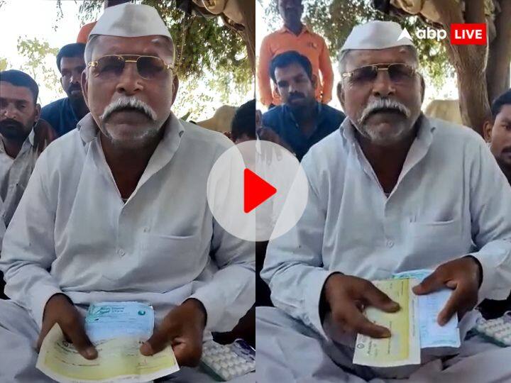 Maharashtra Solapur Surya Traders farmer Rajendra Tukaram Chavan sell onion and get two rupee cheque Watch: 70 किलोमीटर का सफर और 512 किलो प्याज की कीमत सिर्फ 2 रुपए! महाराष्ट्र के किसान का छलका दर्द