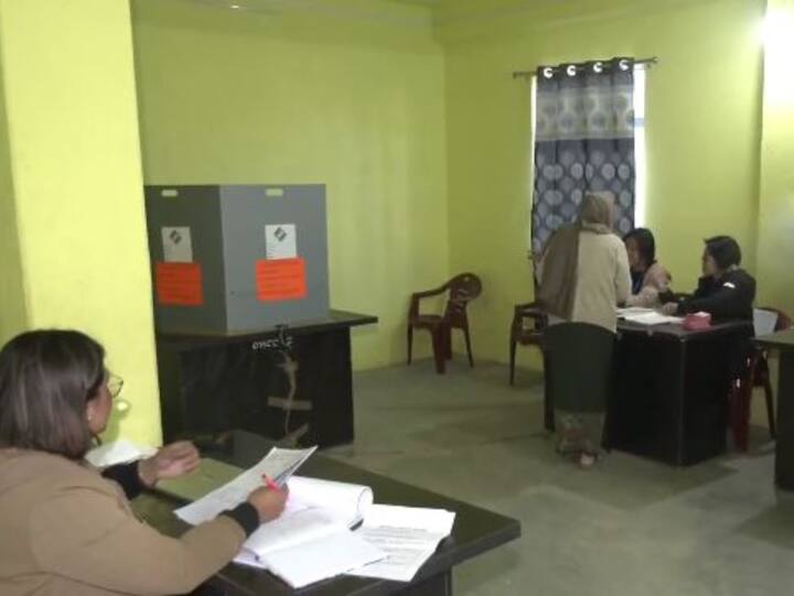 People in Nagaland's Kohima vote to elect a new government in the single-phased Assembly polls underway in 59 constituencies amid tight security on Monday. (Image Source: Twitter/ANI)