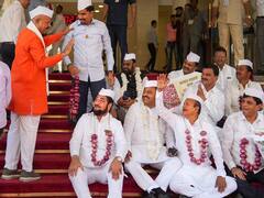 Oppn MLAs Arrive Wearing Onion Garlands At Maharashtra Assembly To Protest Against Fall In Prices. In Pics