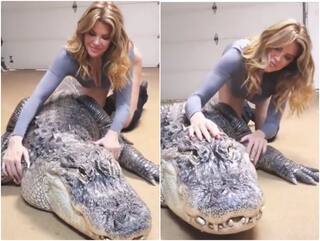 खूंखार मगरमच्छ की मसाज करती नजर आई खूबसूरत लड़की ,यूजर्स बोले- यहां ये फिसल गया