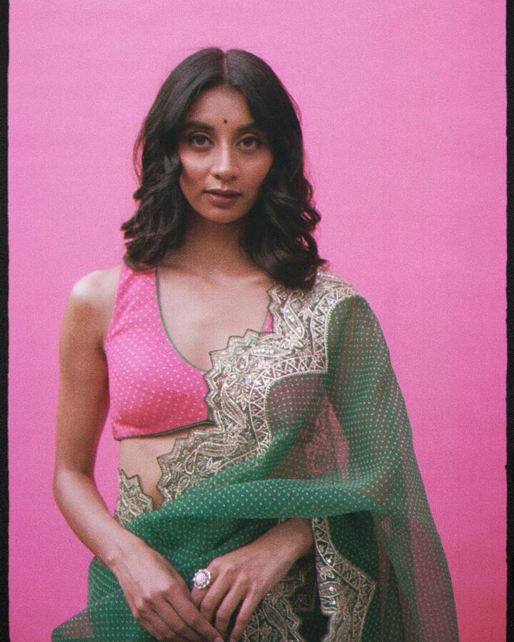 Dolly wore a pink and green saree by Torani