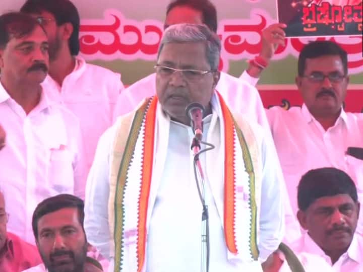Karnataka Politics: '40 प्रतिशत कमीशन सरकार' पर घिरे सीएम बोम्मई, कांग्रेस नेता सिद्धारमैया बोले- अमित शाह बड़े झूठे... Karnataka Congress protest in Bengaluru Demand arrest of BJP MLA Maadal Virupakshappa six crore rupees seized BJP Amit Shah Siddaramaiah Karnataka Politics: '40 प्रतिशत कमीशन सरकार' पर घिरे सीएम बोम्मई, कांग्रेस नेता सिद्धारमैया बोले- अमित शाह बड़े झूठे...