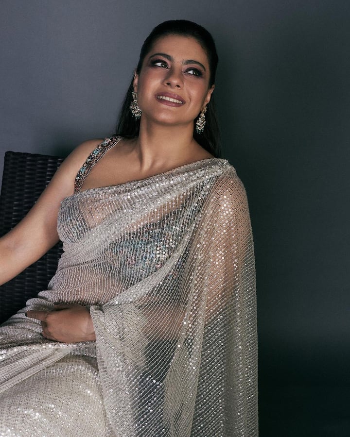 She kept her make-up minimal with smoky eyes and a nude lip shade. A pair of danglers completed her look.