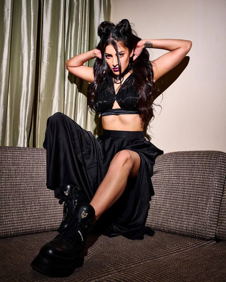 Shruti wore black boots with her outfit