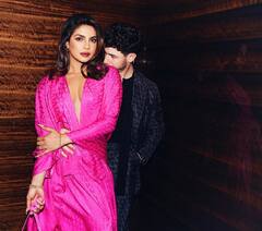 Priyanka Chopra Pics: डीपनेक आउटफिट में प्रियंका चोपड़ा ने फ्लॉन्ट किया कर्वी फिगर, पति की बाहों में बाहे डालकर दिए रोमांटिक पोज
