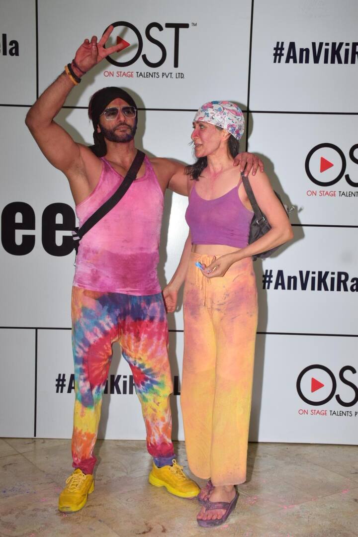 Karanvir Bohra poses with wife Teejay Sidhu at the Holi party.