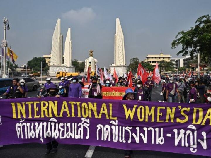 Members of Thai labour unions, state enterprises and women’s rights activists prepare to march on International Women’s Day in Bangkok. Image Source: AFP