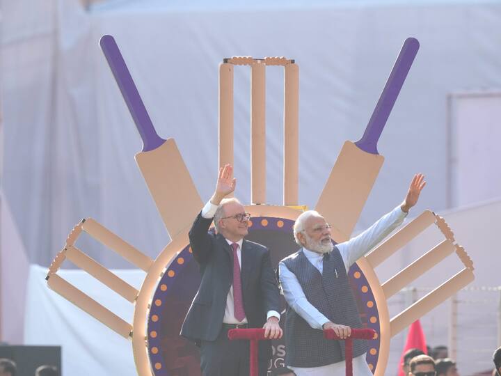 Prime Minister Narendra Modi and Australian Prime Minister Anthony Albanese take a lap inside the stadium before the start of the fourth test cricket match between India and Australia, at Narendra Modi stadium in Ahmedabad, Thursday, March 9, 2023.