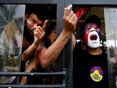 Tibetans Protest Near Chinese Embassy In Delhi On 64th National Uprising Day, Many Detained. In Pics