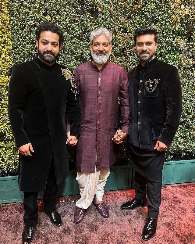 RRR director SS Rajamouli, actor Ram Charan, Jr NTR pose for the camera at the 95th Academy Awards. (Image: Twitter)