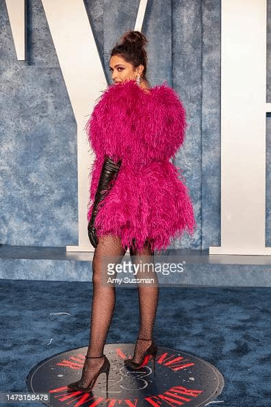 Deepika Padukone graced the Oscars after-party in a bright fuchsia pink  feather dress