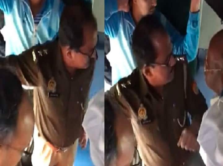 Watch: Elderly TTE bravely stands up to officers of UP Police travelling without ticket in train, video goes viral பயணச்சீட்டு இல்லாமல் ரயிலில் பயணித்த உ.பி. போலீஸ்; தட்டிக்கேட்ட டிடிஇ: வைரலாகும் வீடியோ