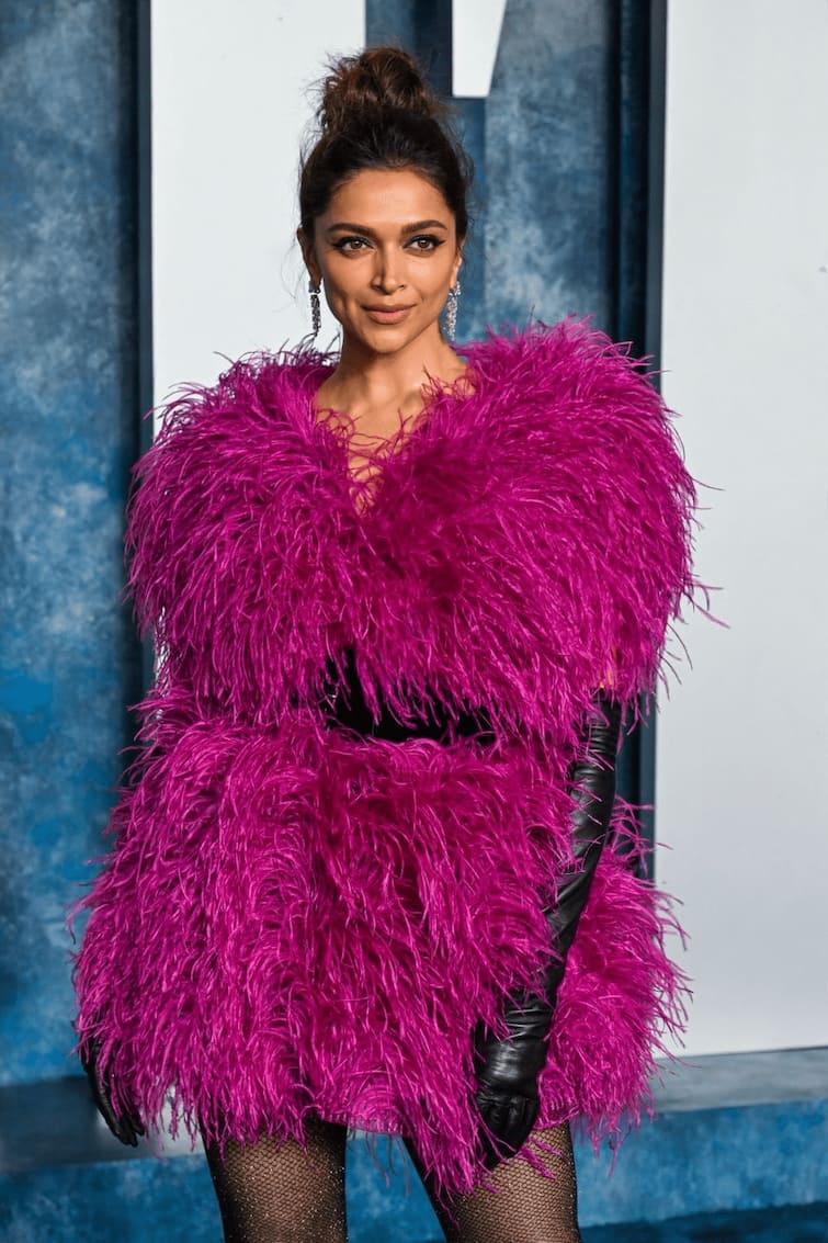 Deepika Padukone graced the Oscars after-party in a bright fuchsia pink  feather dress