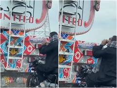 पहले चलते ट्रक पर बीयर रखी, फिर पीछे बाइक चलाता रहा और पीता रहा... देखें वीडियो