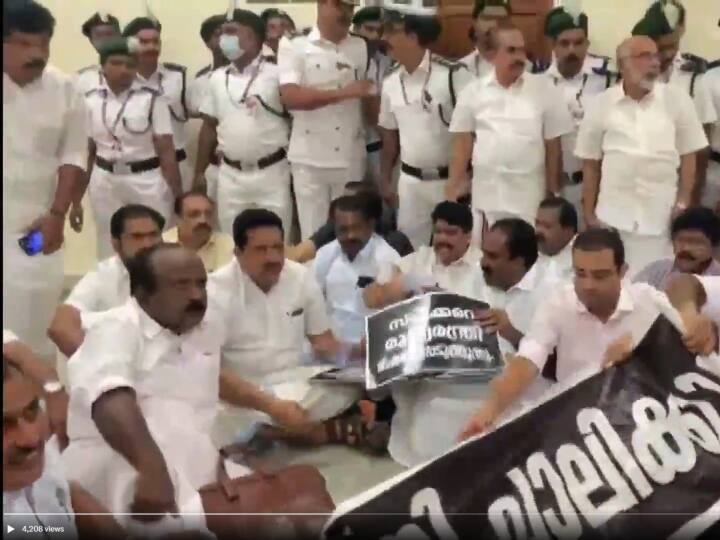 Kerala Assembly Ruckus: Opposition MLAs lying on the ground outside Kerala Assembly Speaker’s office, guards forcibly removed, video viral