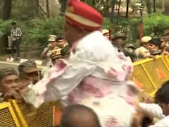 Congress Worker Dressed As Groom Tossed Over Police Barricade During Adani Row Protest: Watch