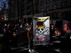 Thousands Hit The Streets In France As President Macron Pushes For Pension Reforms. SEE PICS