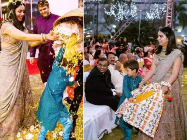 ईशा अंबानी की देवर की शादी में भी उन्होंने बेहद ही खूबसूरत लहंगे को चुना और आपको बता दें कि यह लहंगा डार्क ग्रे कलर का था और बेहद ही खूबसूरत है. ईशा ने इस लुक के साथ में ब्राइडल ज्वेलरी रिपीट की थी जो कि सब्यसाची की थी.