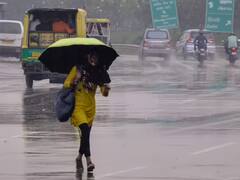 Weather Update: दिल्ली-NCR में हवा के साथ बारिश, ओले भी गिरे, देखें तस्वीरें