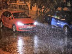 Weather Update: दिल्ली-NCR में हवा के साथ बारिश, ओले भी गिरे, देखें तस्वीरें