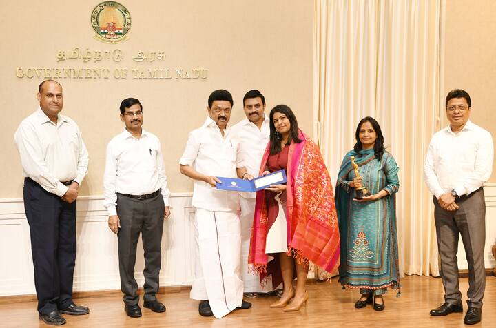The CM presented a shawl to Kartiki Gonsalves