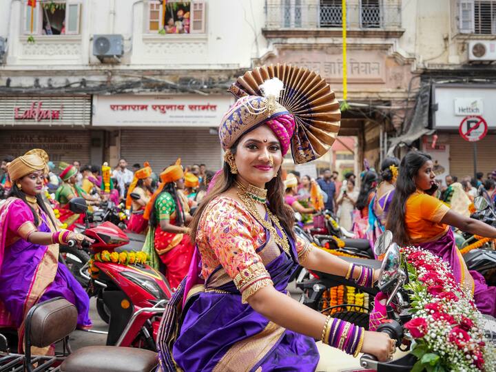 Women in traditional attire take part in a procession to celebrate the Marathi New Year, 'Gudi Padwa', at Girgaon in Mumbai. (Image Source: PTI)