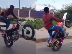 बंदे ने चलती बाइक पर दिखाए खतरनाक स्टंट, लोग बोले- इसके सामने धूम के स्टंट भी फेल हैं...