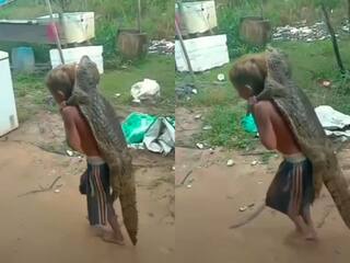 Video: पीठ पर मगरमच्छ को लादे घूम रहा है छोटा लड़का, कभी देखी है ऐसी भयंकर दोस्ती...?