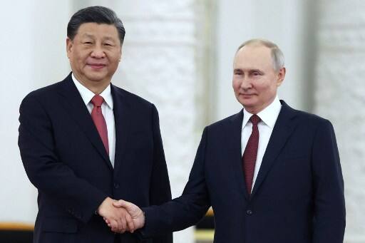 Russian president Vladimir Putin endorsed yuan as the currency of choice on Chinese president Xi Jinping Moscow visit रूस-चीन के बीच नजदीकियों की एक और तस्वीर, पुतिन ने कहा- विदेश व्यापार में युआन पर स्विच करने को तैयार