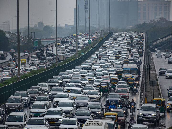 Vehicles stuck in a traffic jam on Delhi-Gurugram Expressway due to rains, in Gurugram, Friday, March 24, 2023.