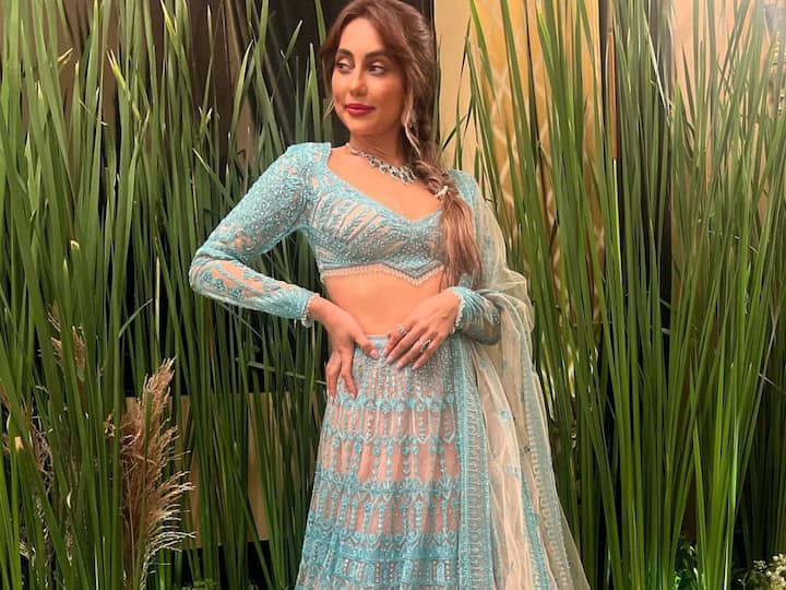 Anusha Dandekar wore a blue-beige Falguni Shane Peacock Lehenga and looked dapper as ever