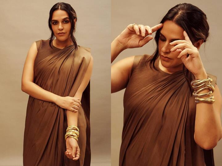 Neha Dhupia looked elegant in an olive green saree with a western touch. Check out pics