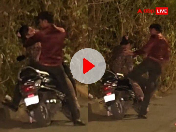 Mumbai crime man assults woman on part scooter in Malad Mumbai video goes viral Watch: 'पहले बाल पकड़ा, फिर गला दबाया और...', मुंबई में कपल से मारपीट का वीडियो वायरल