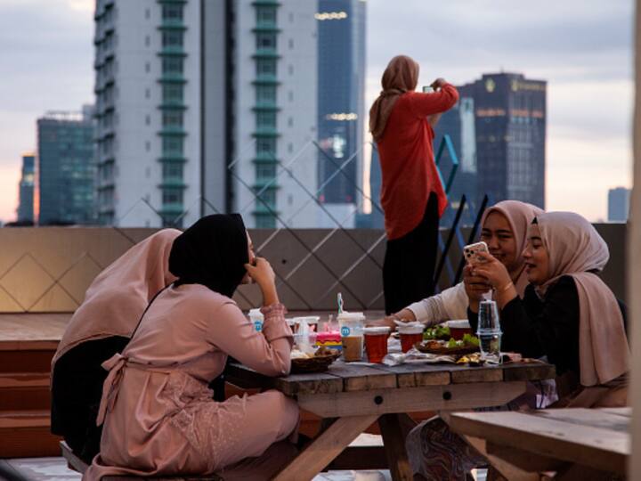 Muslims in Indonesia break their fast at a cafe rooftop in capital city Jakarta during the month of Ramadan. The ninth month of the Islamic calender began on March 23 around the world.